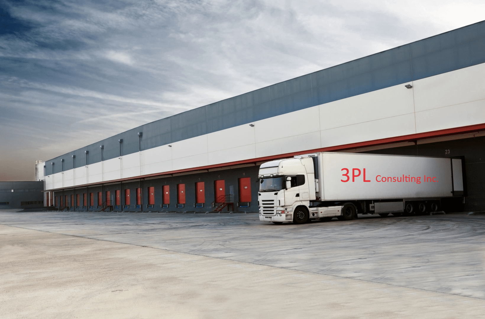 A truck is parked in front of a building.